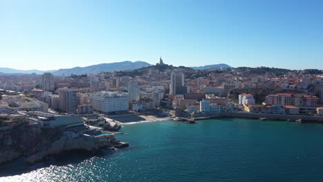Marseille-aerial-back-traveling-from-Catalan-beach-Old-Port-of-Marseille